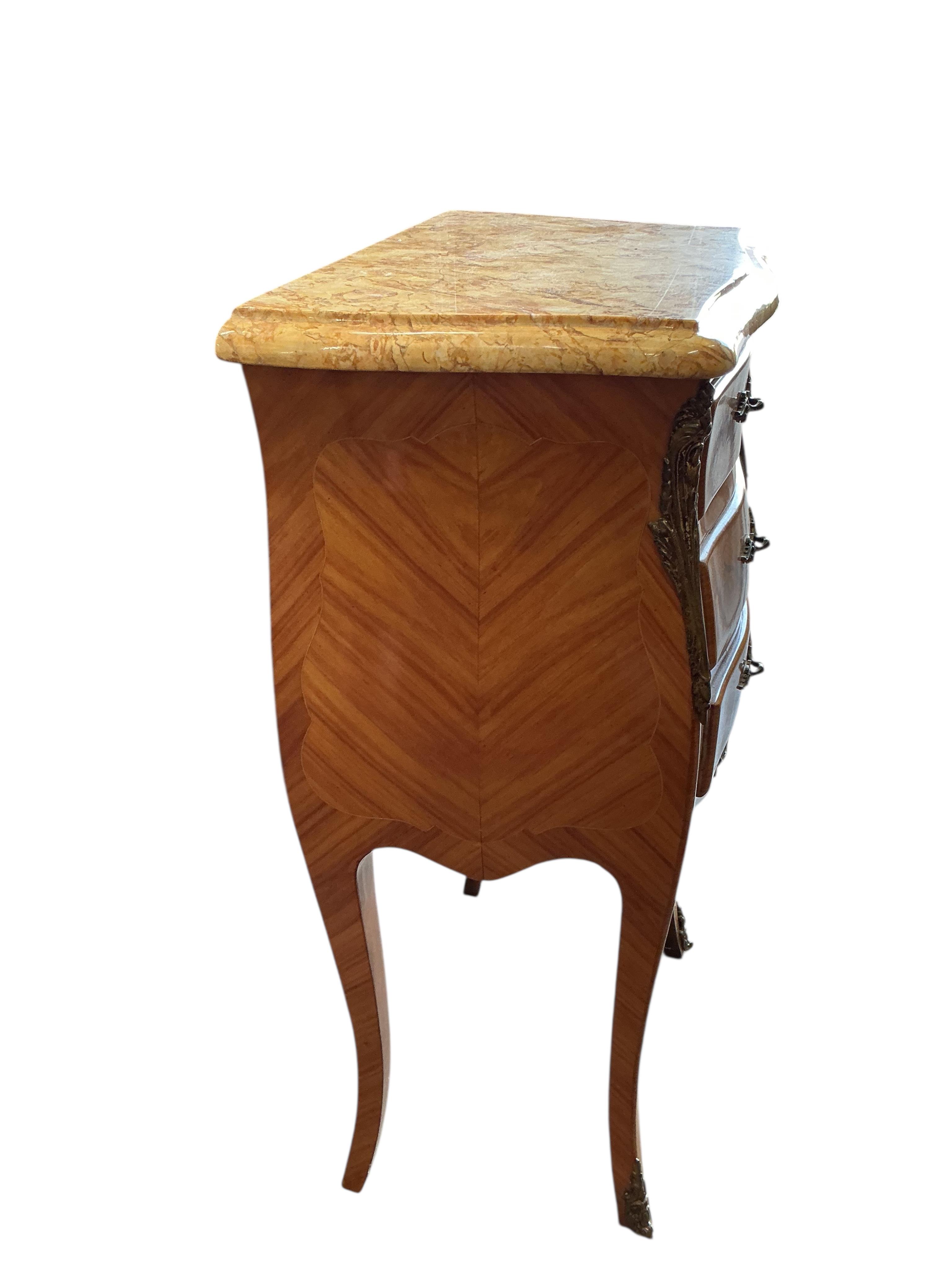 A pair of Louis XV style brass mounted bedside chests, width 42cm, depth 29cm, height 76cm